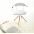 Modern fabric covered seat with swivel wood armchair